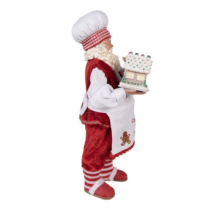 Weihnachtsmann mit Lebkuchenhaus