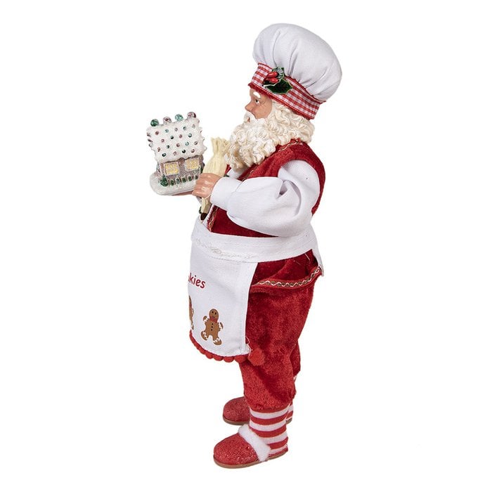 Weihnachtsmann mit Lebkuchenhaus