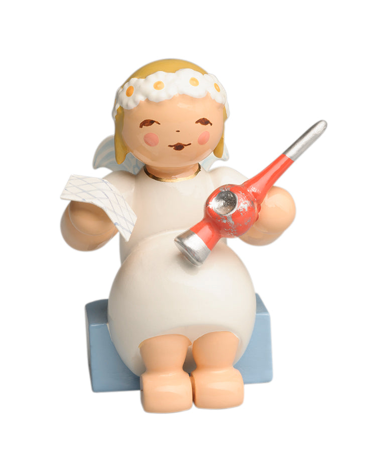 Marguerite ange avec cime d'arbre