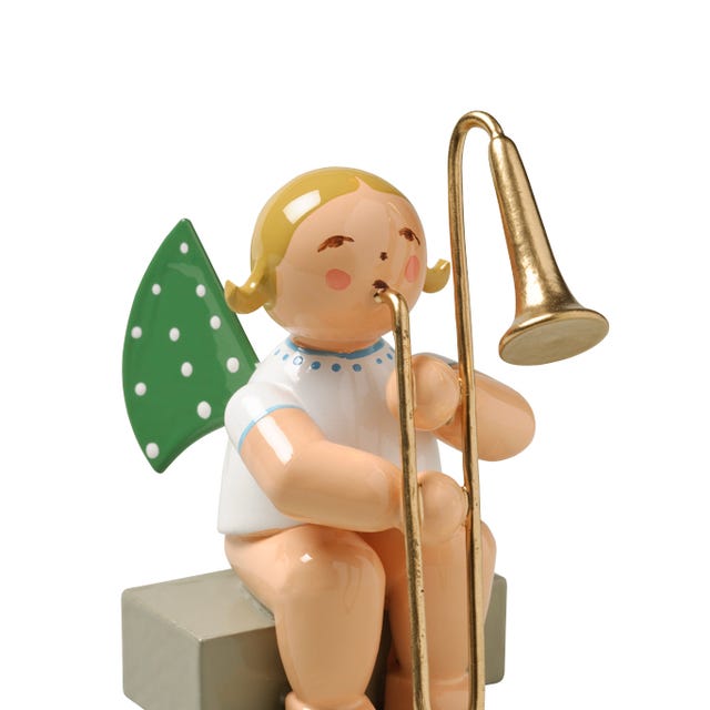Ange avec trombone à coulisse, assis