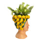 Blumentopf Frau mit Zitronen
