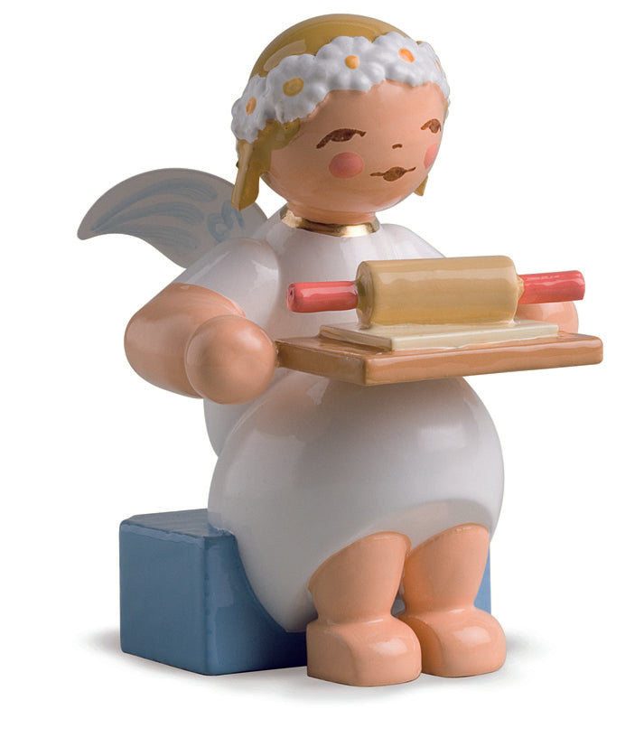 Marguerite ange au rouleau à pâtisserie