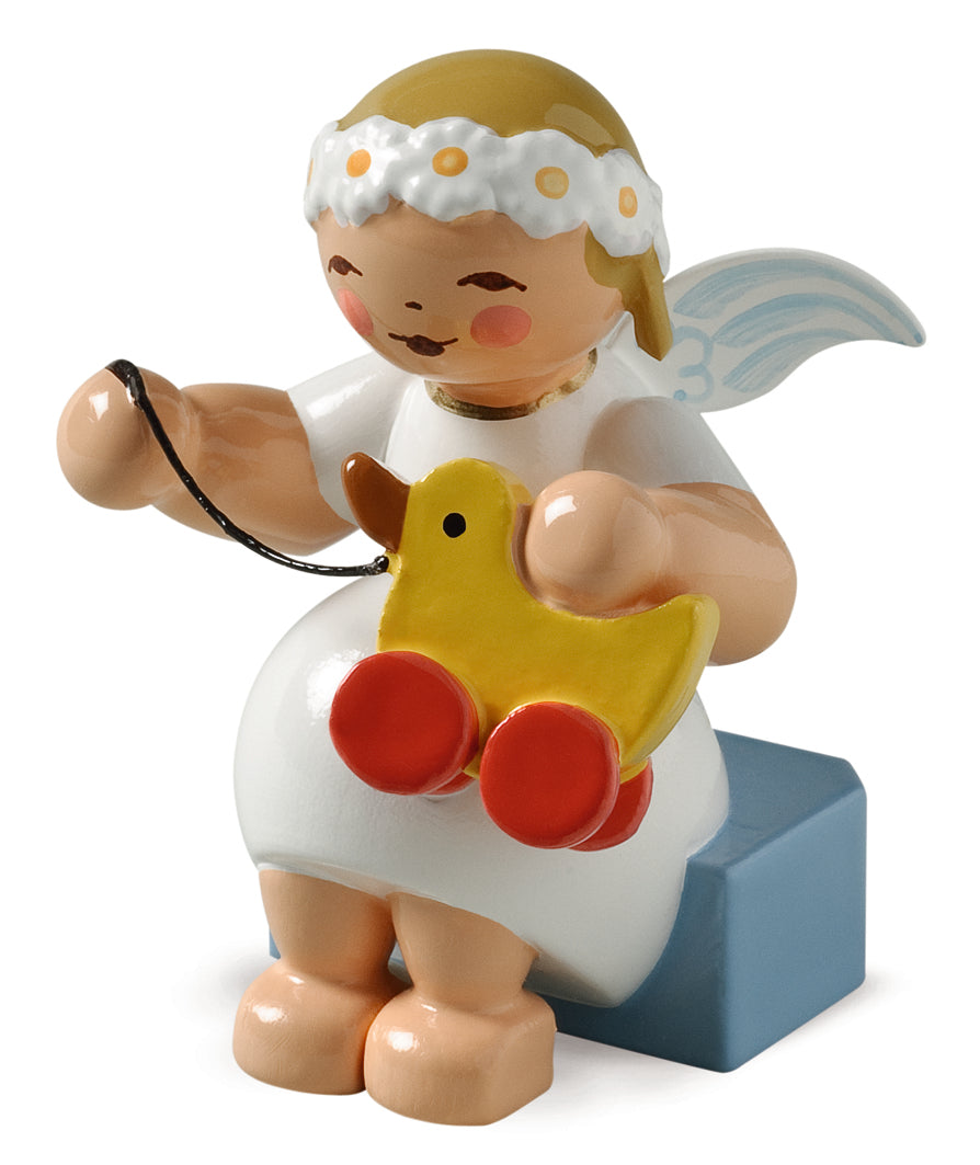 Marguerite angel with toy duck